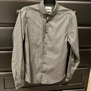 Calvin Klein button down dress shirt.Extreme slim fit.No iron.Size S 14.5, 32/33